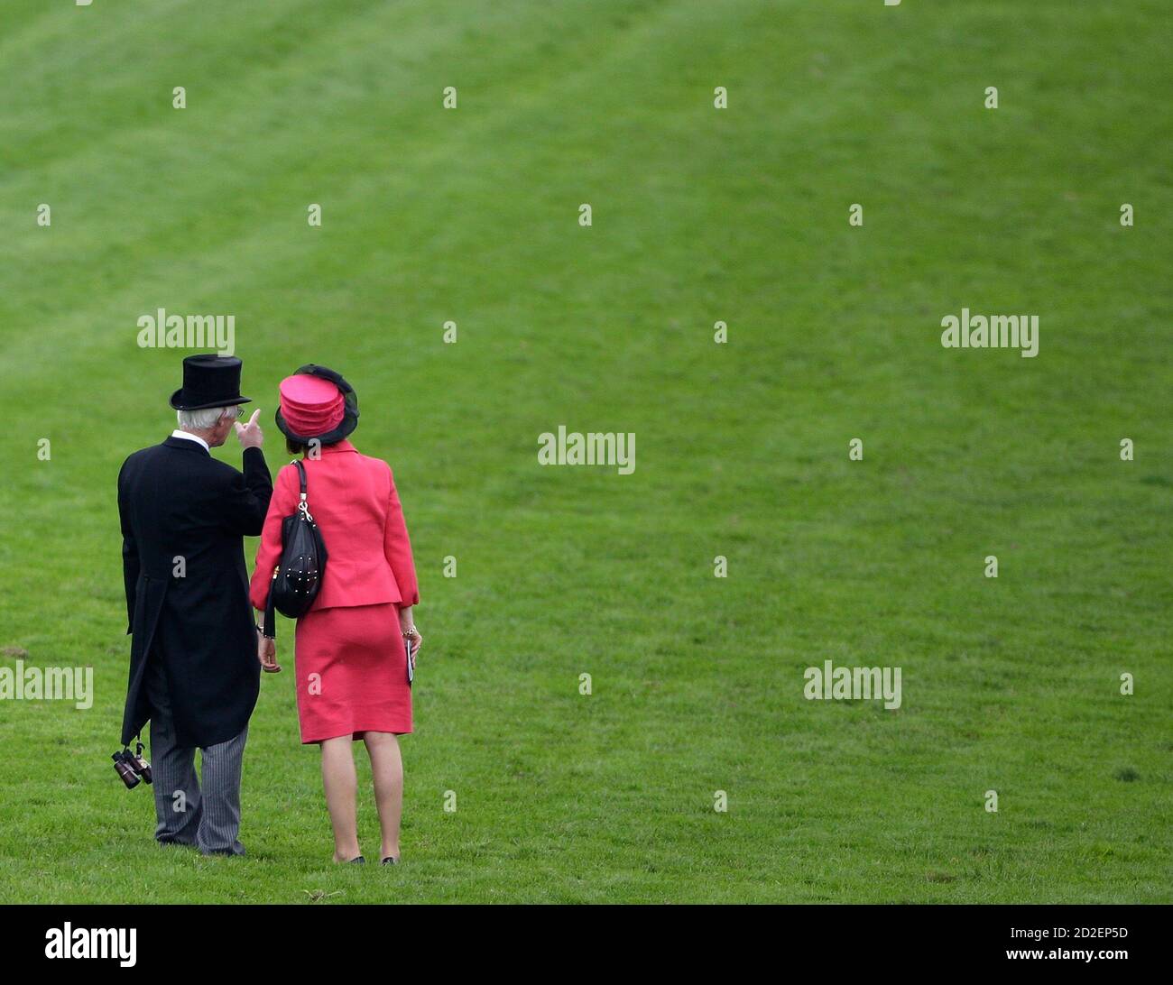 Racegoers view the course before the Derby race during the Epsom Derby Festival at Epsom Downs in Surrey, southern England, June 7, 2008.    REUTERS/Darren Staples   (BRITAIN) Stock Photo