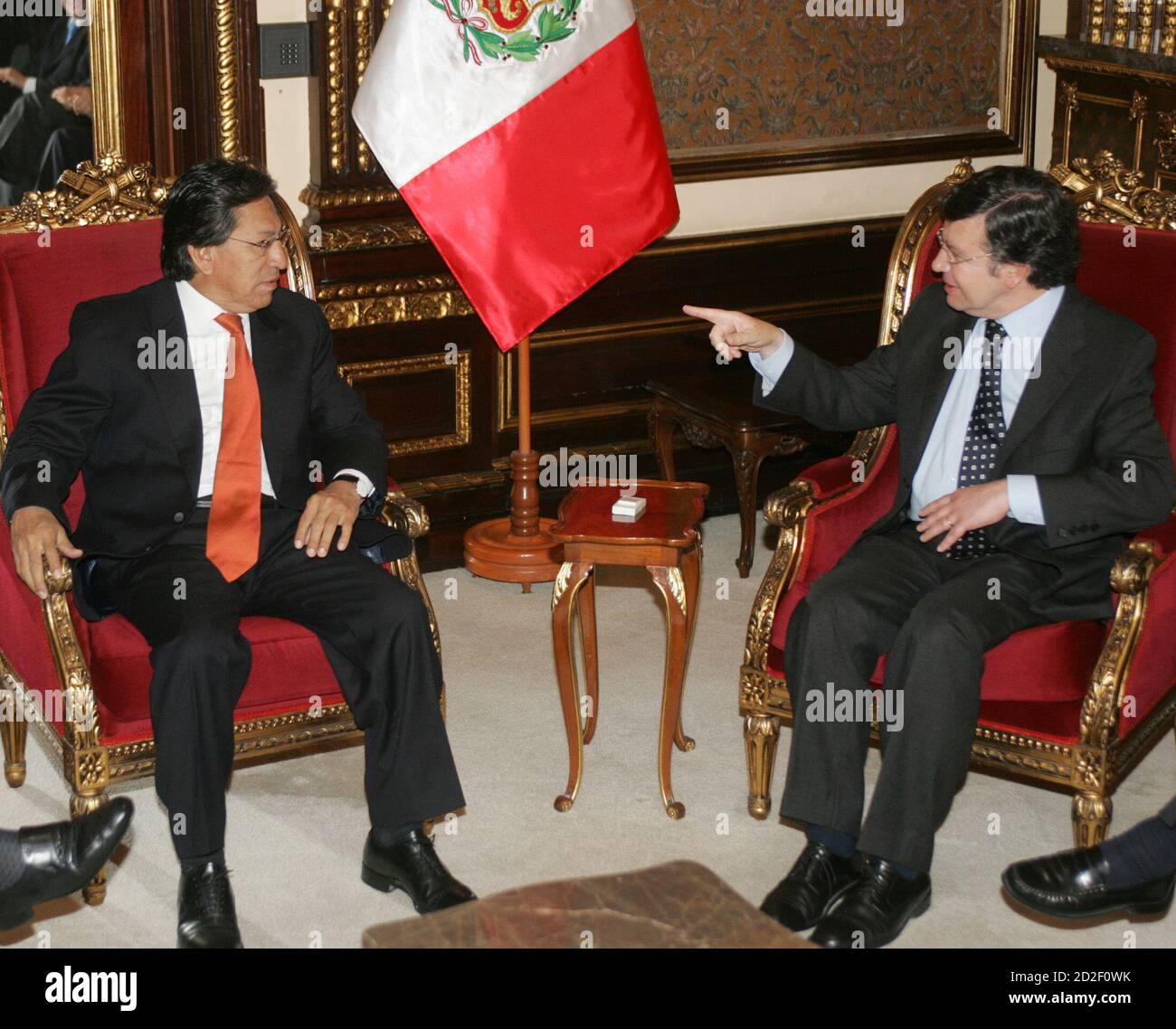 Peruvian President Alejandro Toledo L Talks To Chilean Presidential Candidate Joaquin Lavin During A Meeting At The Government Palace In Lima September 23 2005 Chilean Conservative Candidate Joaquin Lavin Is On A
