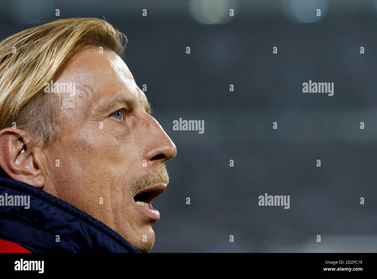 Fenerbahce's coach Christoph Daum of Germany reacts during their Turkey Super League soccer derby match against Besiktas in Istanbul, November 21, 2009. REUTERS/Murad Sezer (TURKEY SPORT SOCCER) Stock Photo