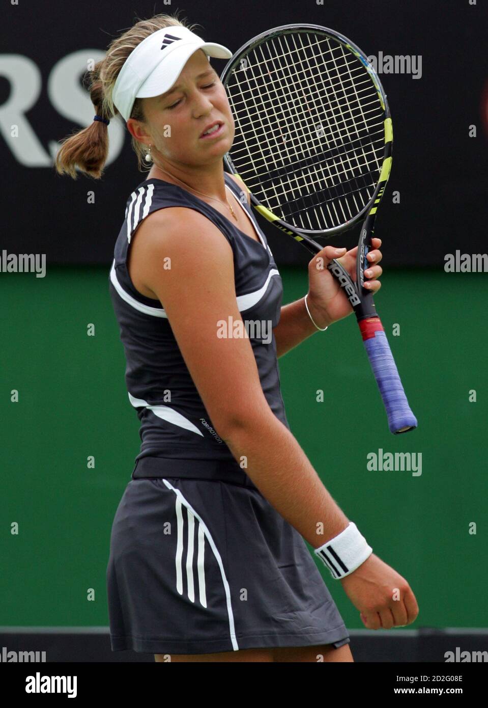 Sophie Ferguson of Australia reacts during her loss to Nadia Petrova of  Russia at the Australian Open tennis tournament in Melbourne January 16,  2006. REUTERS/Claro Cortes IV Stock Photo - Alamy