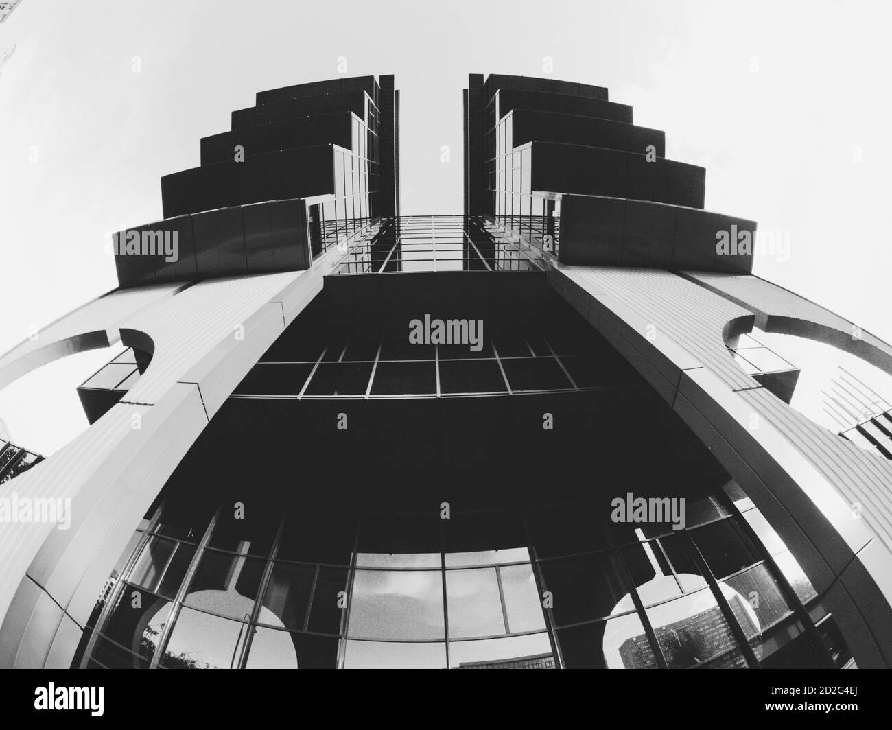 Futuristic business center. Building covered with glass facade. Business glass building Stock