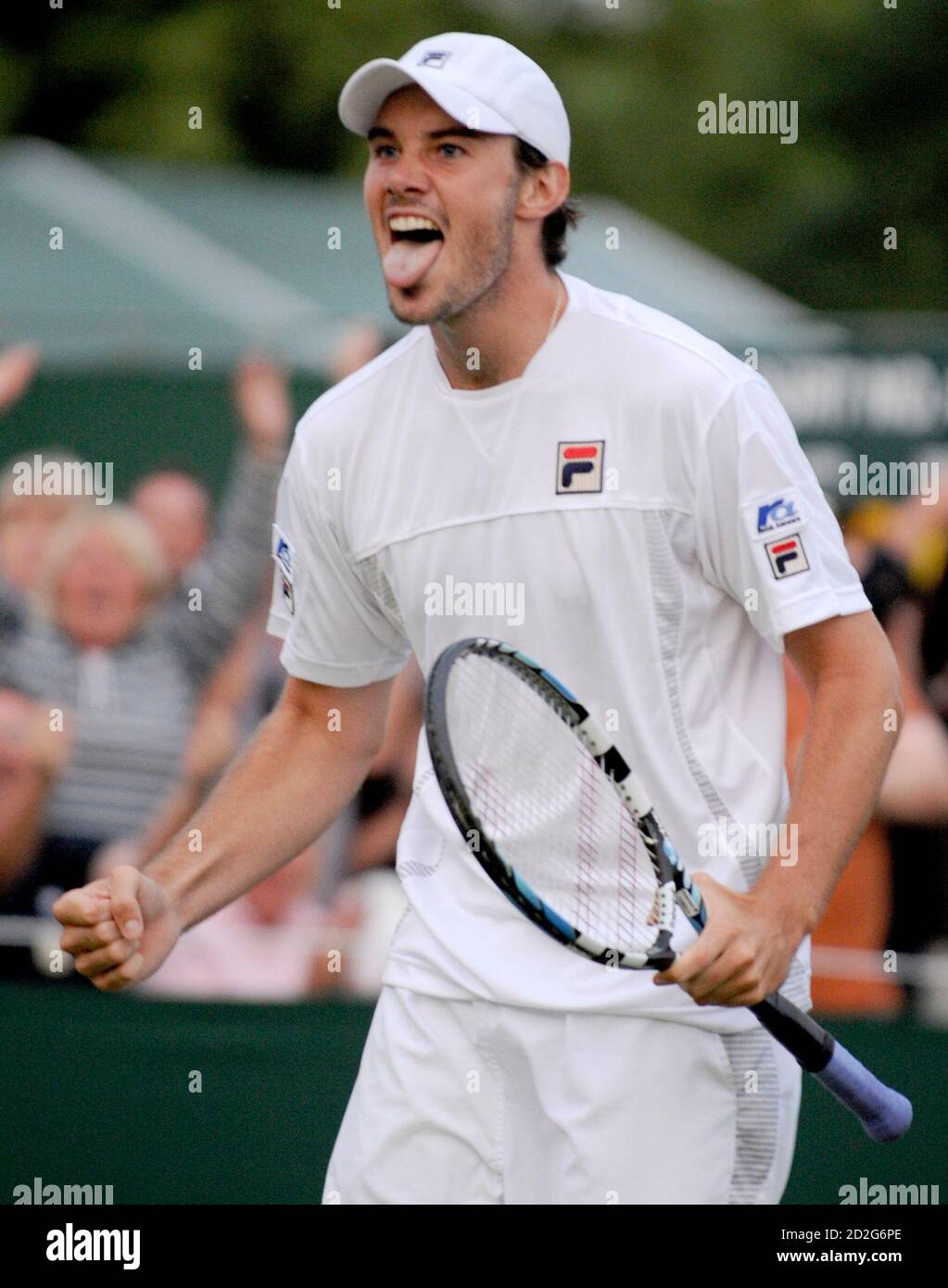 Chris Eaton of Britain celebrates defeating Boris Pashanski of Serbia  during their match at the Wimbledon tennis championships in London June 24,  2008. REUTERS/Toby Melville (BRITAIN Stock Photo - Alamy