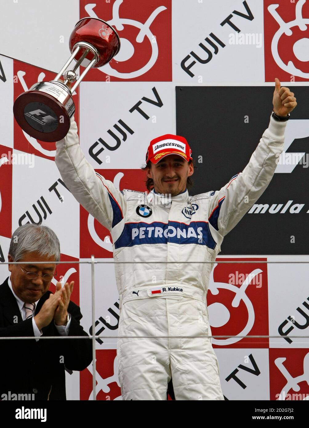 Bmw Sauber Formula One Driver Robert Kubica Of Poland Celebrates After Finishing Second In The Japanese F1 Grand Prix At Fuji Speedway In Oyama Central Japan October 12 08 Reuters Kim Kyung Hoon Japan