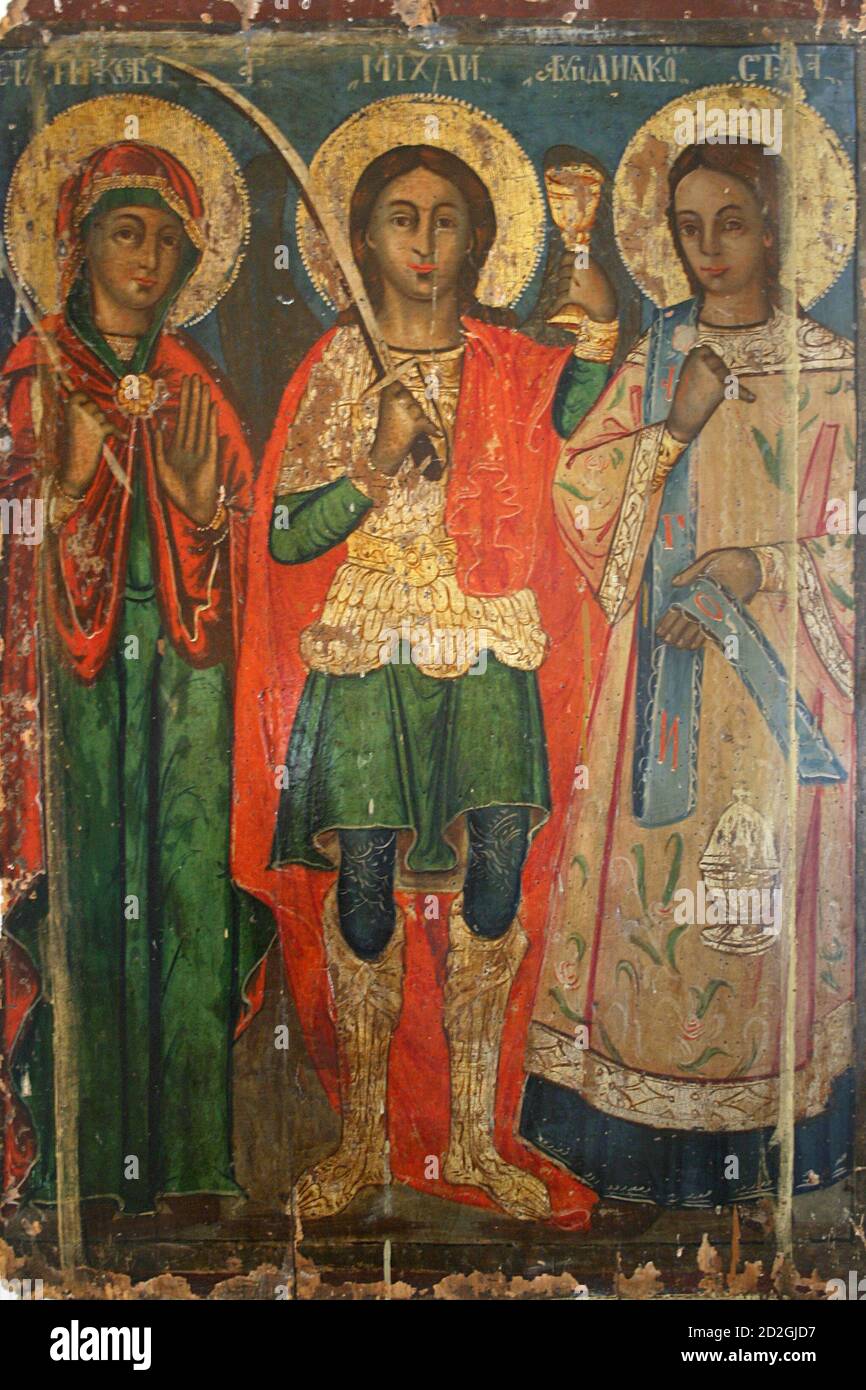 Old Byzantine icon depicting saints, with St. Michael the Archangel in the center Stock Photo