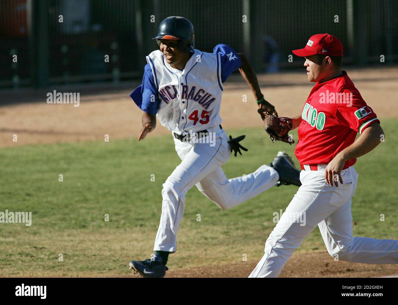 Mexico Pitcher Edgar Huerta 21 Runs Toward Home After Throwing A Wild Pitch To Allow Nicaragua Runner Darrell Walters Castaneda 45 To Score In The 7th Inning In The Concebe Regional Olympic Mexico Pitcher Edgar Huerta 21 Runs Toward Home After Throwing A Wild Pitch To Allow Nicaragua Runner Darrell Walters Castaneda 45 To Score In The 7th Inning In The Concebe Regional Olympic