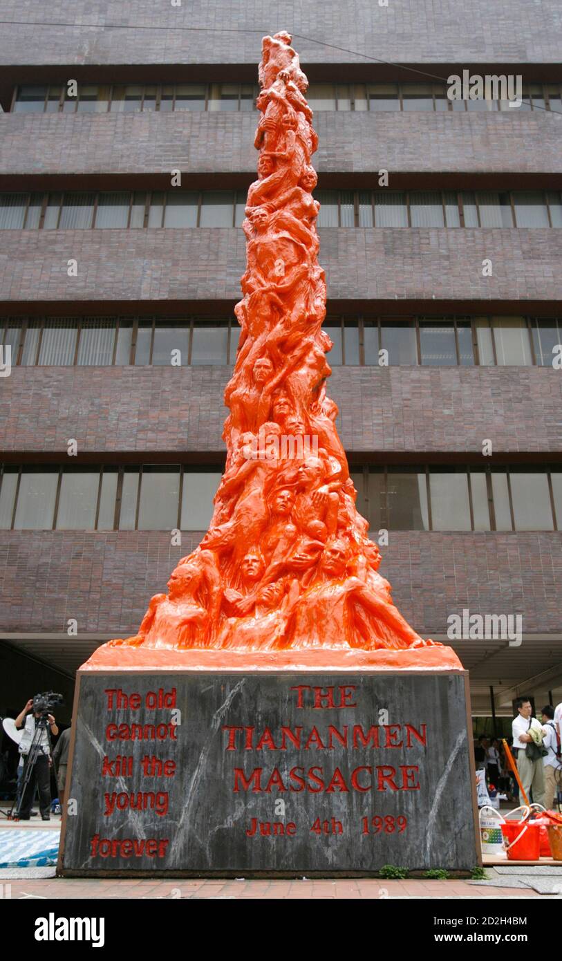 The sculpture "Pillar of Shame" after it had been painted orange during a demonstration by the pressure group the Hong Kong Alliance in support of the Patriotic Democratic Movement of China to express their concerns over human rights in China at the University of Hong Kong April 30, 2008. The sculpture designed by Danish artist Jens Galschiot was created to symbolize those who died in the government crackdown in Tiananmen Square, in Beijing in 1989. REUTERS/Russell Boyce (CHINA) Stock Photo