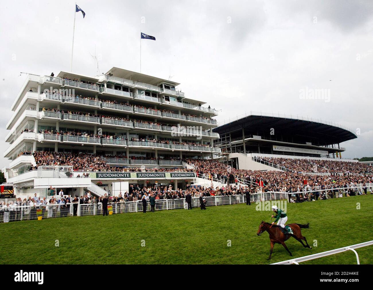 Seb Sanders on his mount Look Here wins the Oak during the Epsom Derby Festival at Epsom Downs in Surrey, southern England June 6, 2008.    REUTERS/Darren Staples   (BRITAIN) Stock Photo