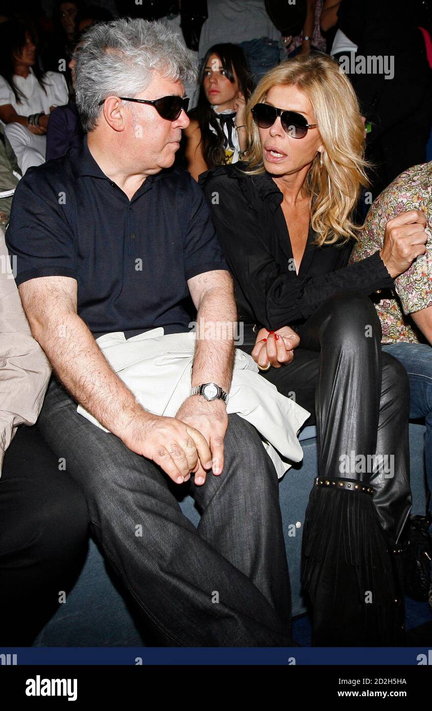 Spanish film director Pedro Almodovar chats with actress Bibi Anderson as  they attend the Cibeles Madrid Fashion Week Spring/Summer 09 fashion show  in Madrid September 16, 2008. REUTERS/Paul Hanna (SPAIN Stock Photo -