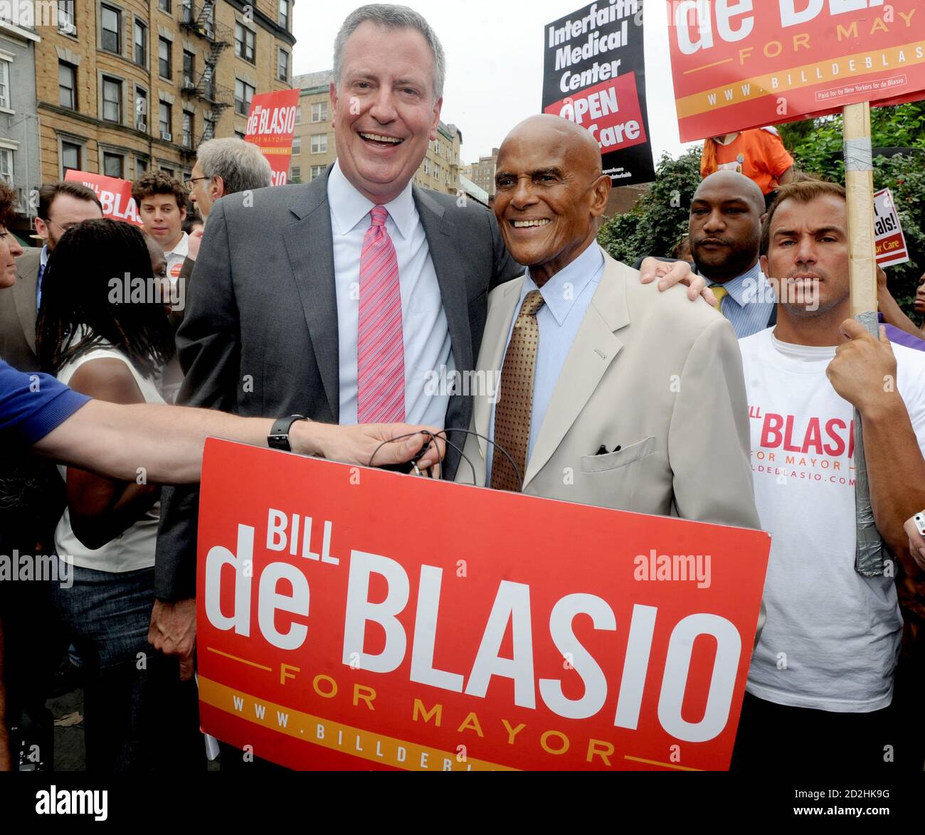 SMG Bill de Blasio Harry Belafonte NY1 Mayor 081913 01.JPG NEW YORK, NY - AUGUST 19: Democratic candidate for Mayor and Public Advocate Bill de Blasio speaks as actor, singer and supporter Harry Belafonte and actress Susan Sarandon look on at a 'Hospitals Not Condos' rally in the West Village on August 19, 2013 in New York City. De Blasio called for quality health care for all New Yorkers and for the end of shuttering city hospitals.  (Photo By Storms Media Group)   People:  Bill de Blasio Harry Belafonte  Transmission Ref:  NY1  Must call if interested Michael Storms Storms Media Group Inc. 3 Stock Photo
