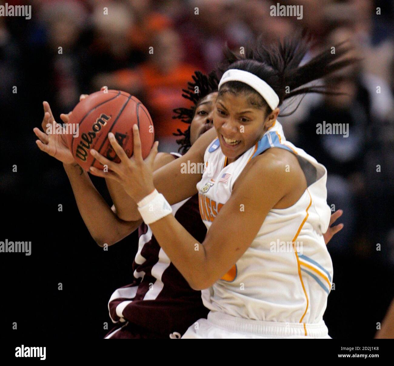 Tennessee guard Candace Parker (R) fights Texas A&M guard Danielle Gant for  control of the ball in the first half of the NCAA women's regional final  basketball game in Oklahoma City, Oklahoma