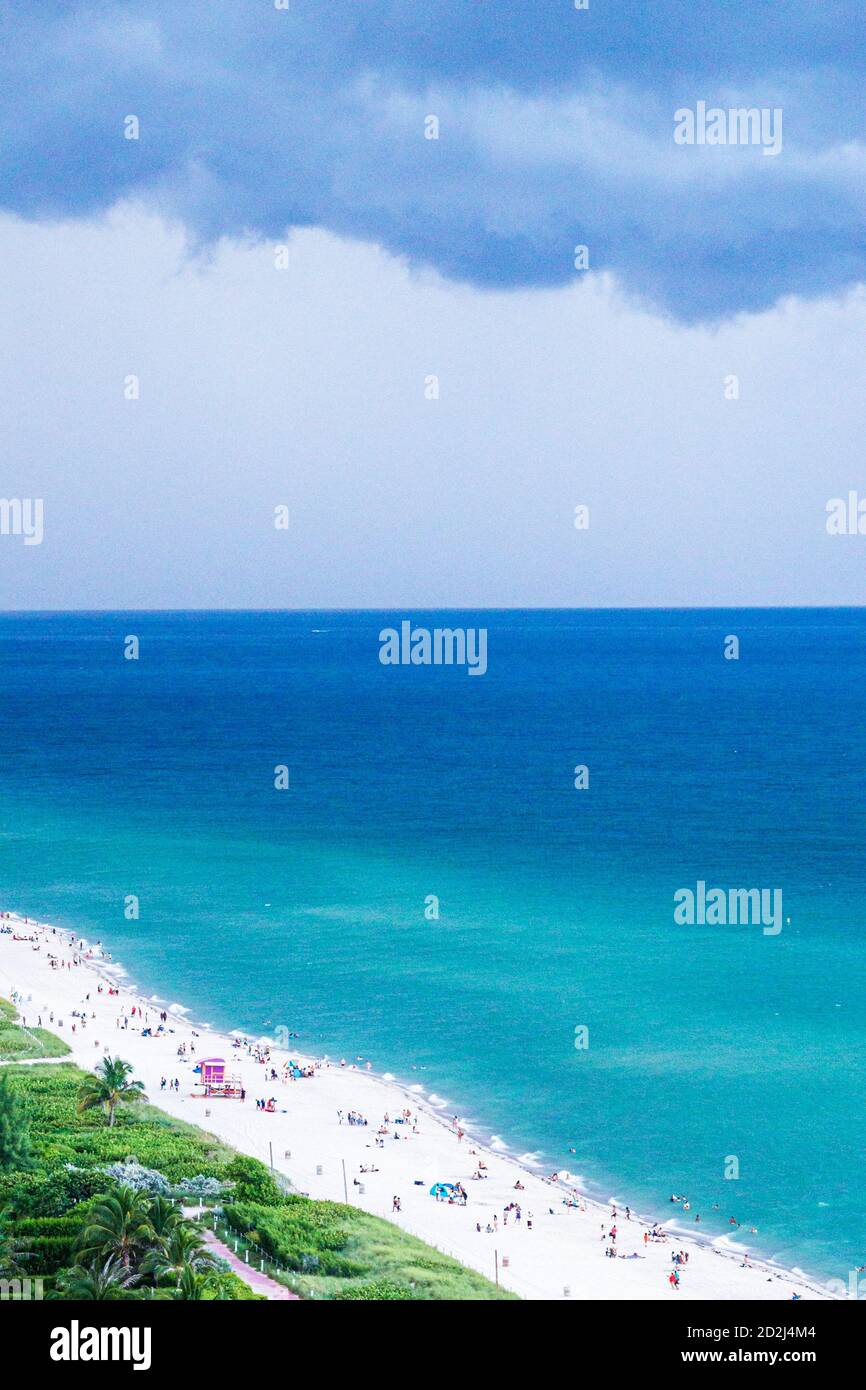 Miami Beach Florida,Atlantic Ocean water,weather clouds sky storm rain,sand,shore stormfront,visitors travel traveling tour tourist tourism landmark l Stock Photo