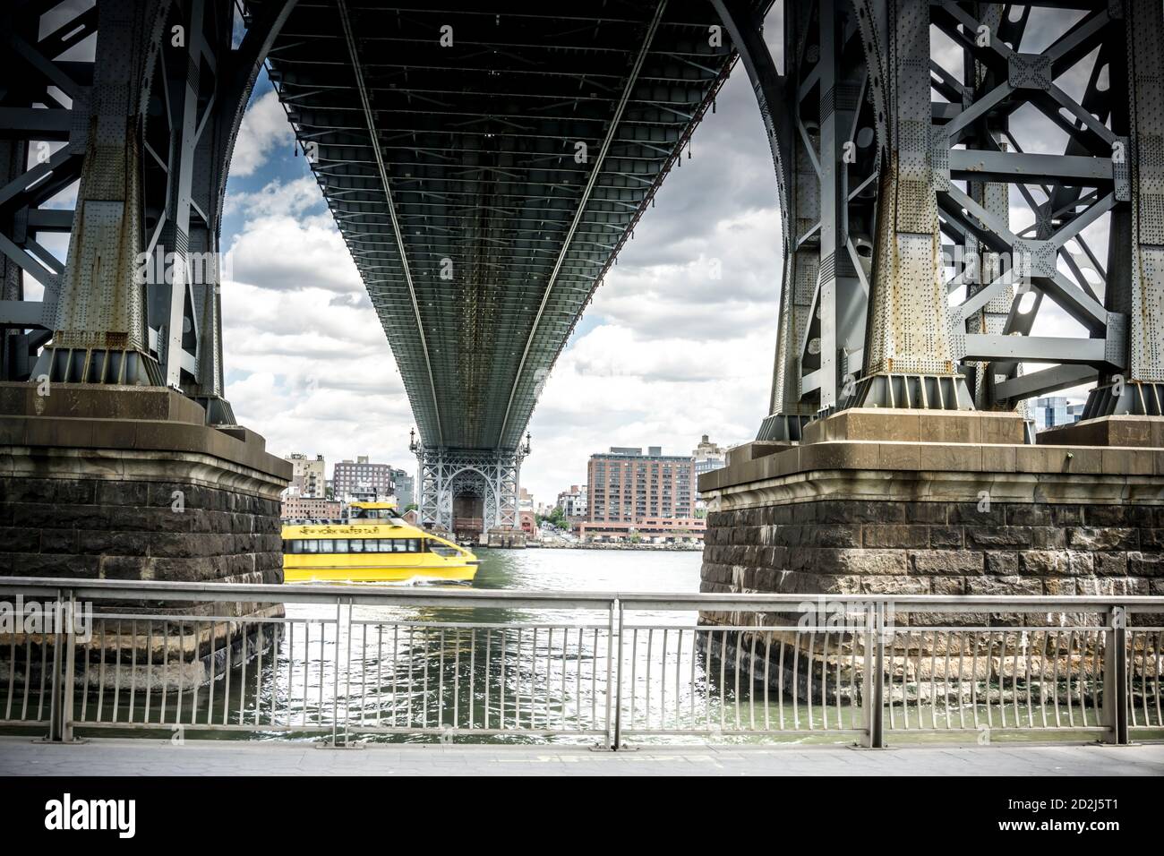 View of Williamsburg Bridge beneath. Looking at Brooklyn side and a NYC