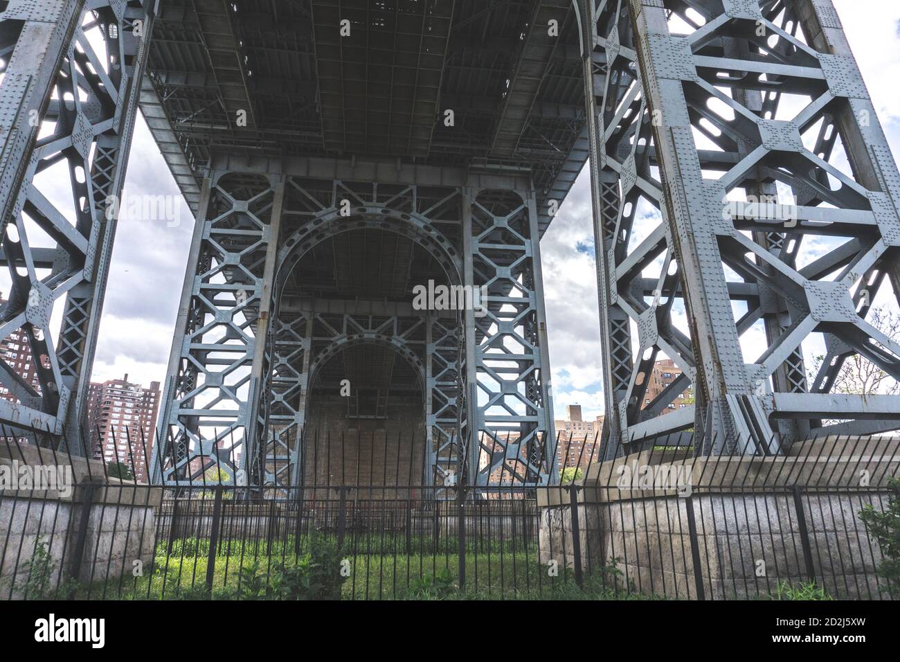View of bridge from below. Williamsburg bridge with view of Lower East
