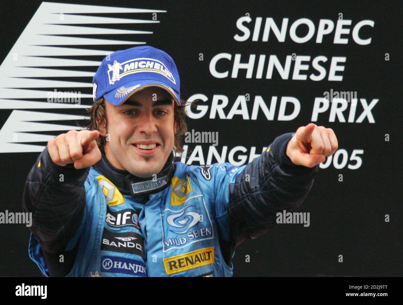 Renault S World Champion Formula One Driver Fernando Alonso Of Spain Celebrates At The Podium After Winning