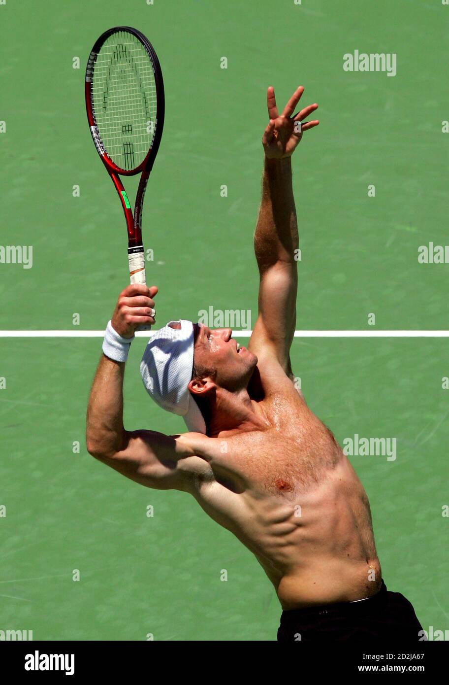 Germany's Rainer Schuettler serves during a training session at Melbourne  Park January 14, 2006. Schuettler is training in preparation for the  Australian Open, the first Grand Slam tennis tournament of the year,