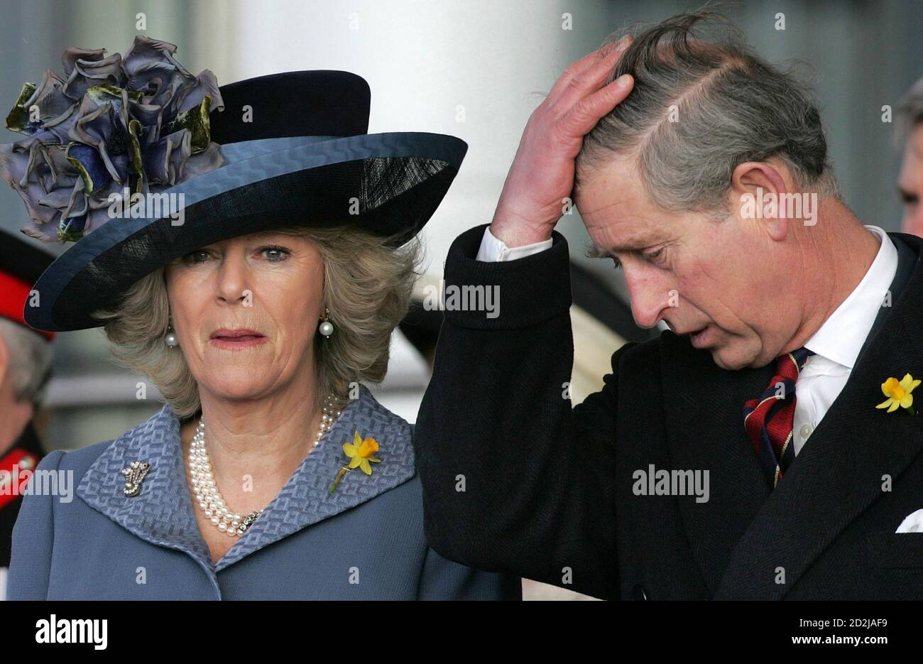 Britain's Camilla Duchess of Cornwall (L) and Prince Charles arrive to mark the official opening of the Welsh Assembly Building in Cardiff, Wales, March 1, 2006. [Other senior British royals, including Queen Elizabeth II, Prince Philip and Prince Charles, attended the ceremony.] Stock Photo