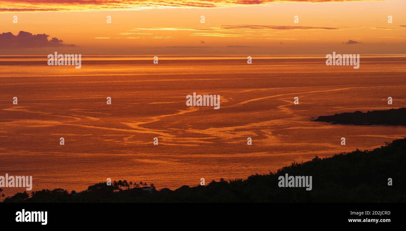 Panorama at dusk over Kealakekua Bay, with ocean water patterns in South Kona, Hawaii Island. Stock Photo
