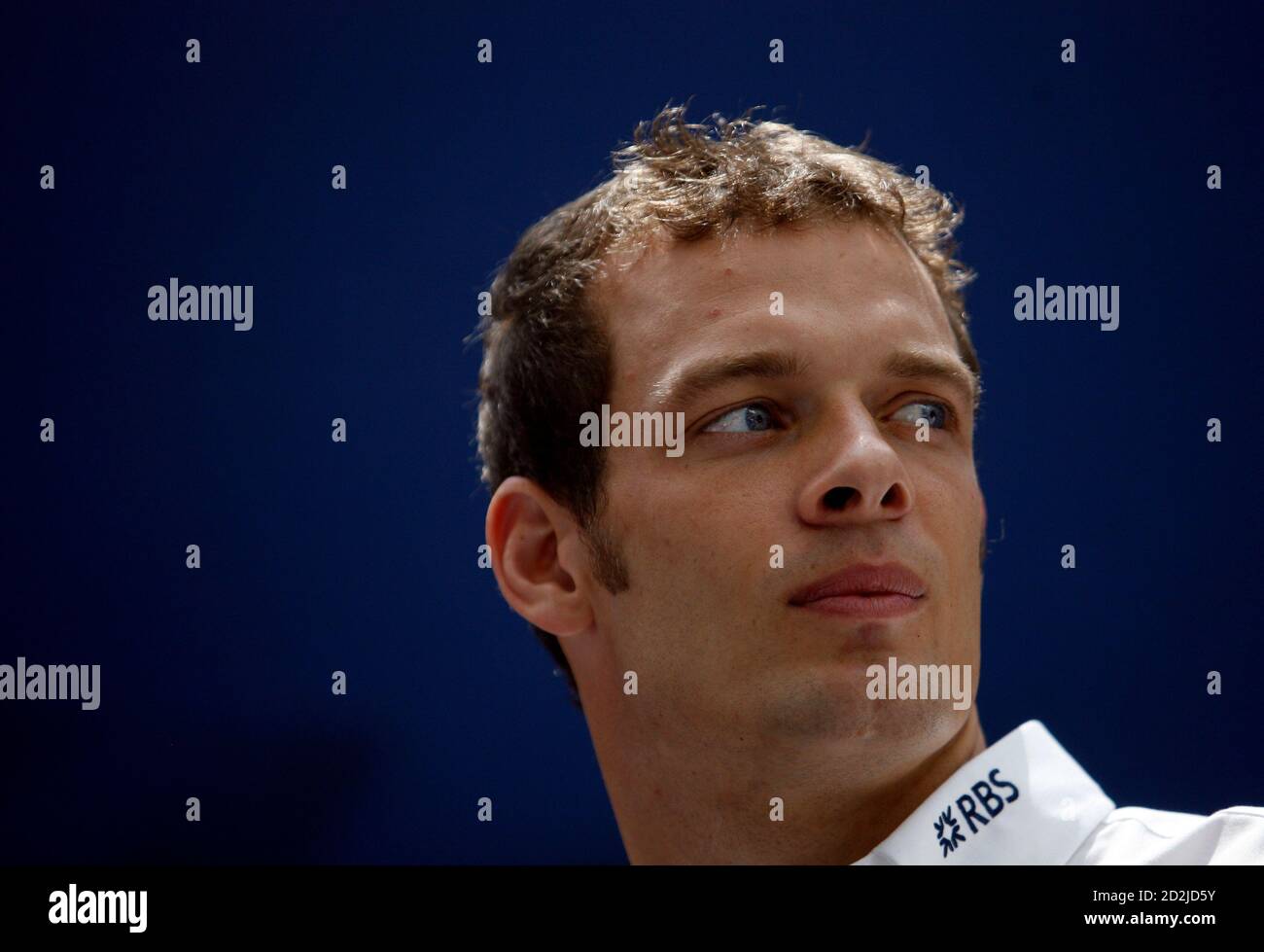 Williams Formula One (F1) driver Alex Wurz of Austria attends a news conference during the Grand Prix Challenge in Singapore April 4, 2007. Singapore is the second city in the world to hose the Grand Prix Challenge, in which members of the public compete on a simulator to attain the best lap times on a simulated circuit. Three top participants from Singapore competed against Williams F1 drivers Narain Karthikeyan and Wurz during the grand finals on Wednesday.  REUTERS/Nicky Loh (SINGAPORE) Stock Photo