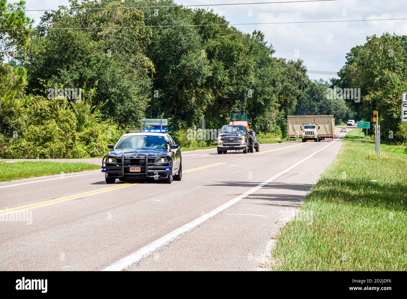 Florida,Mabel,State Road Route 50,twolane road,oversize oversized load approaching,police car