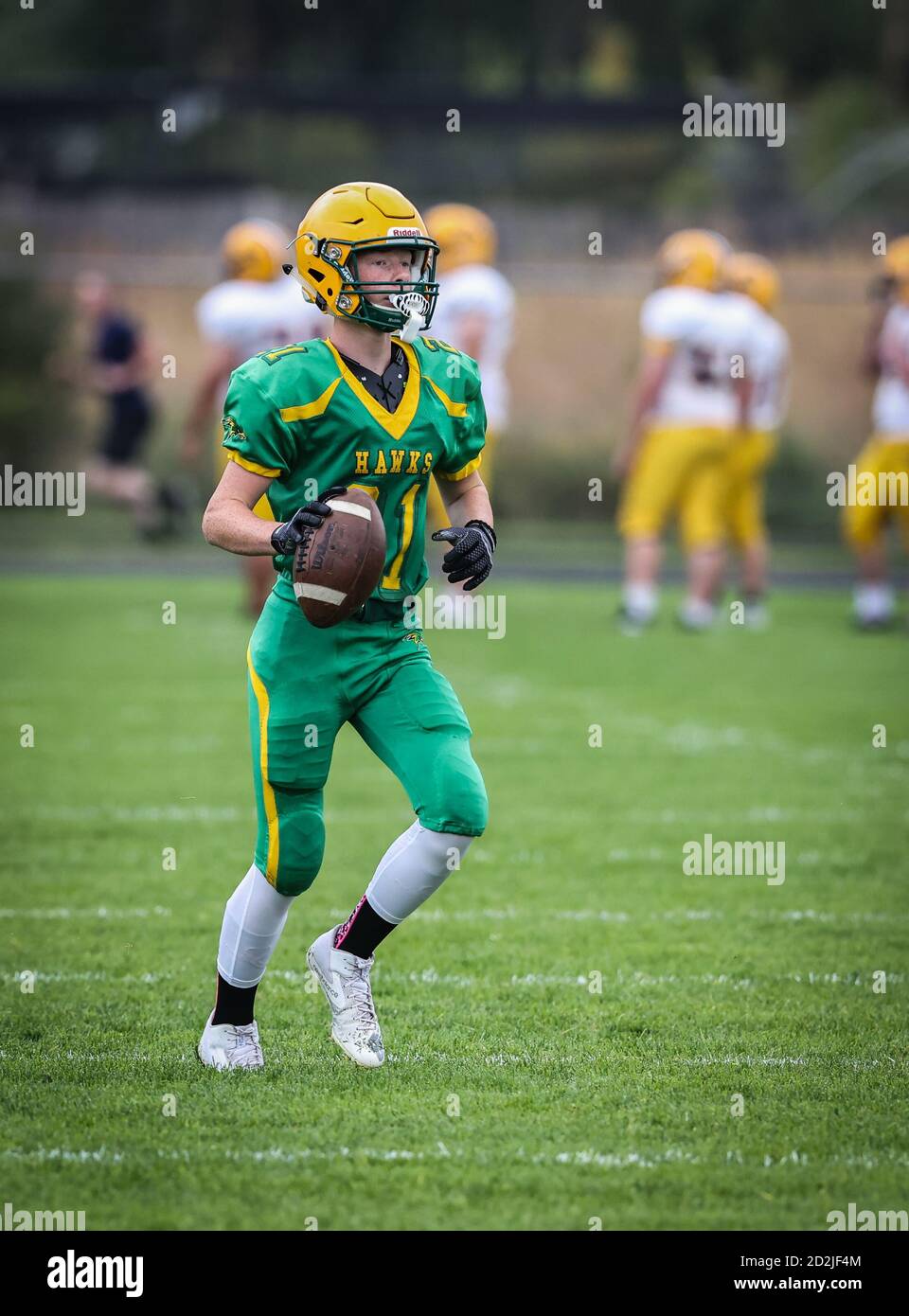 Tackle football action with Lewiston vs Lakeland High School freshmen