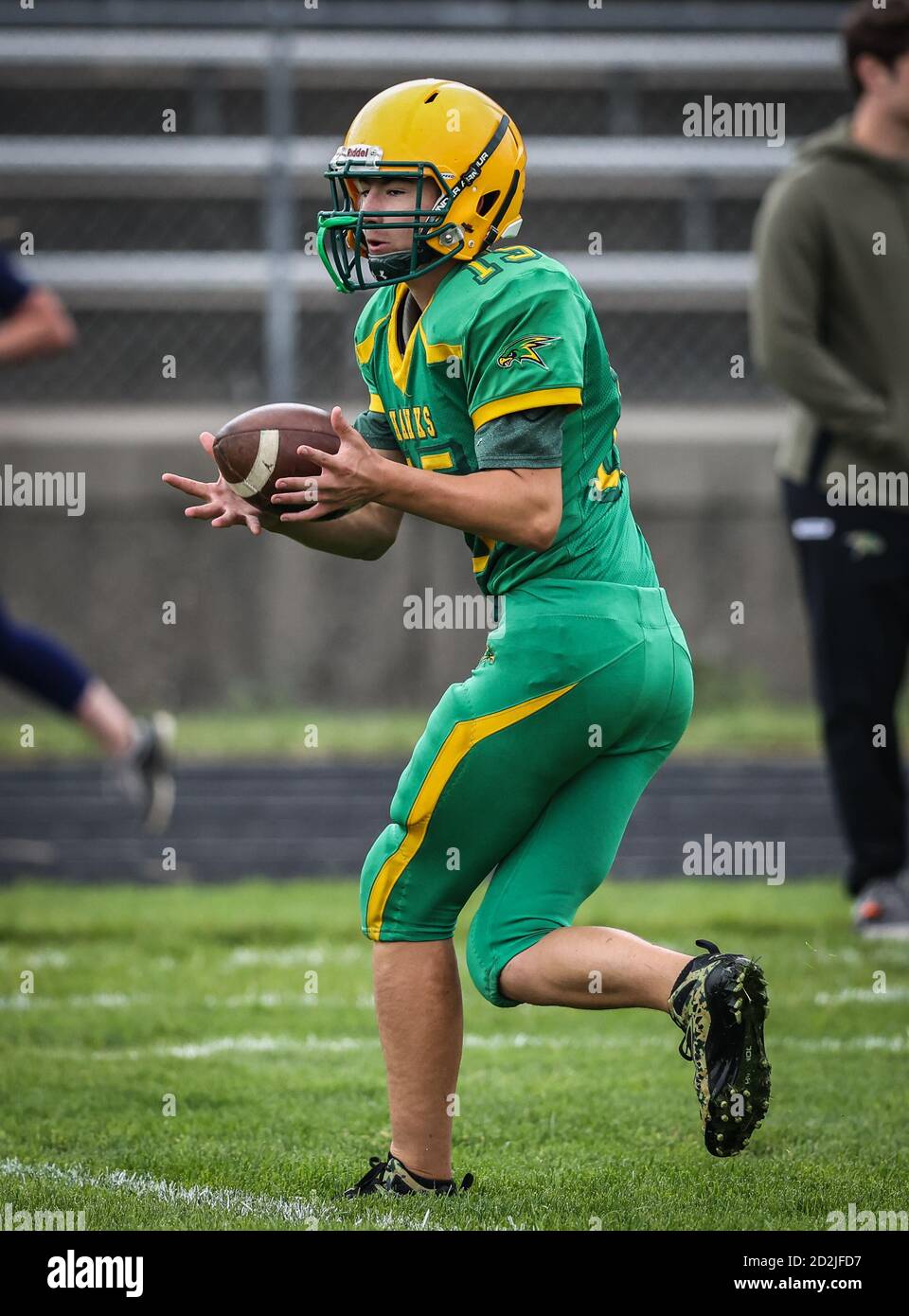 Tackle football action with Lewiston vs Lakeland High School freshmen