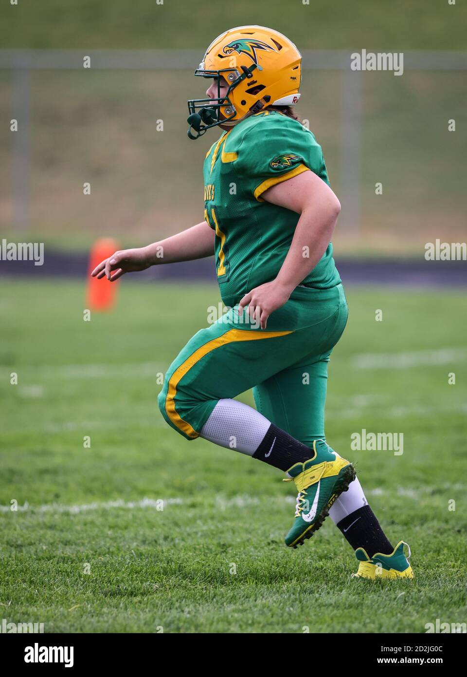 Tackle football action with Lewiston vs Lakeland High School freshmen teams in Rathdrum, Idaho. Stock Photo