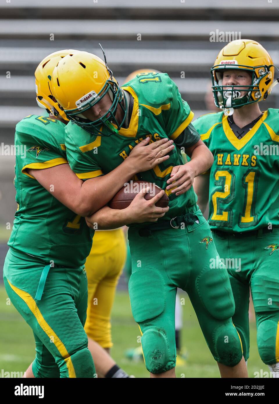 Tackle football action with Lewiston vs Lakeland High School freshmen