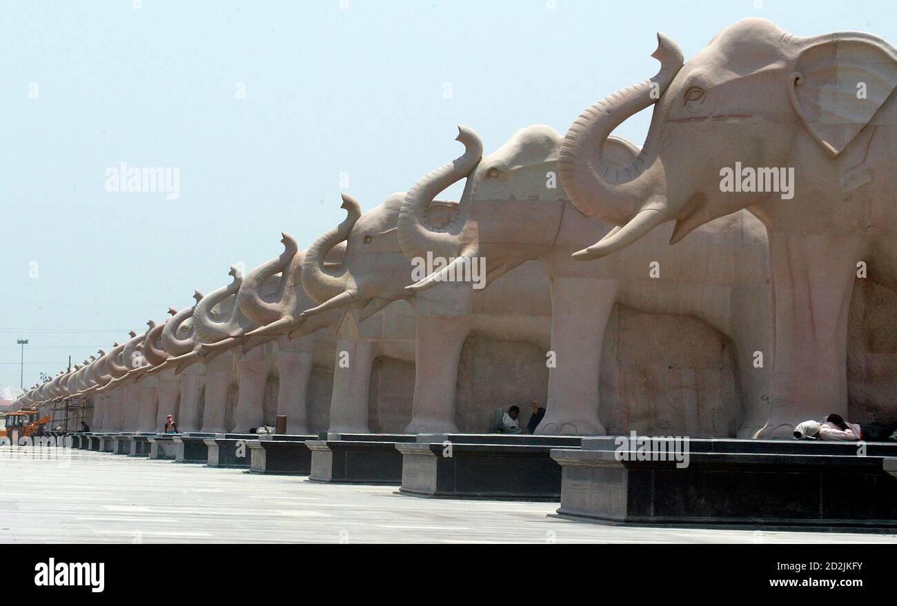 lucknow elephant high resolution stock photography and images alamy https www alamy com labourers rest under elephant statues made of stone inside the ambedkar memorial park in the northern indian city lucknow may 15 2009 the park has been built by mayawati the untouchables chief of the rising bsp who has prime ministerial ambitions and is criticised for squandering public money on building statues of herself and memorials honouring indias millions of lower caste people the bsp whose political symbol is the elephant mainly draws support from people of the lower caste or dalits who were once considered untouchable by higher caste hindus reuterspawan kumar india emp image380267887 html