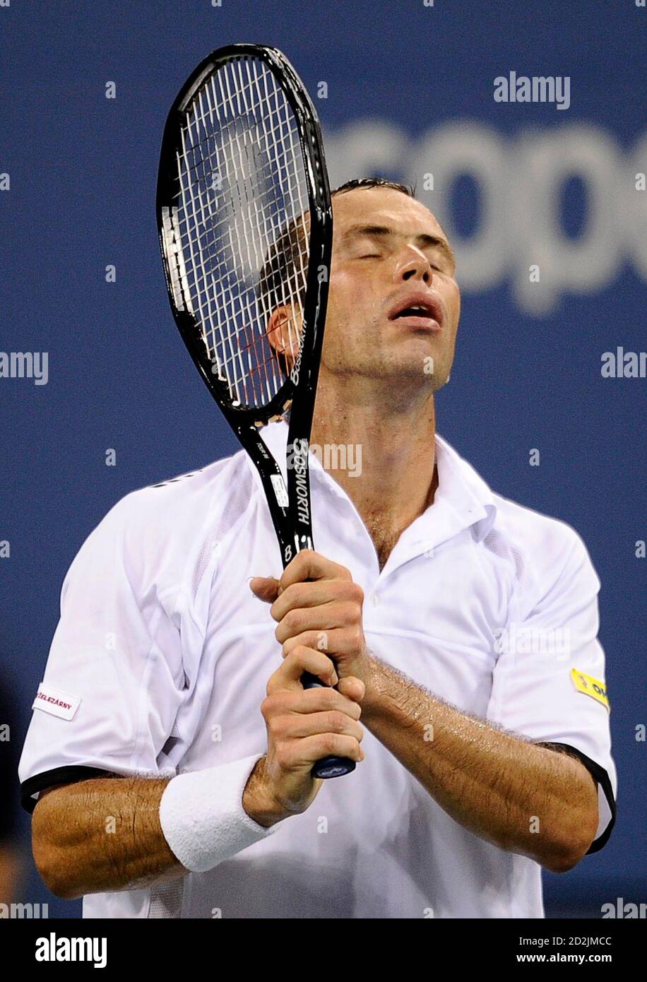 Radek Stepanek of the Czech Republic reacts after missing a shot to Novak  Djokovic of Serbia during their evening match at the U.S. Open tennis  tournament in New York, September 7, 2009.