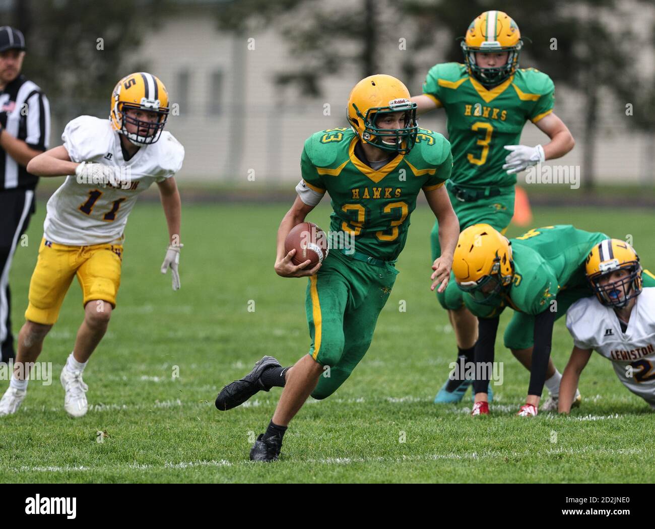 Tackle football action with Lewiston vs Lakeland High School freshmen