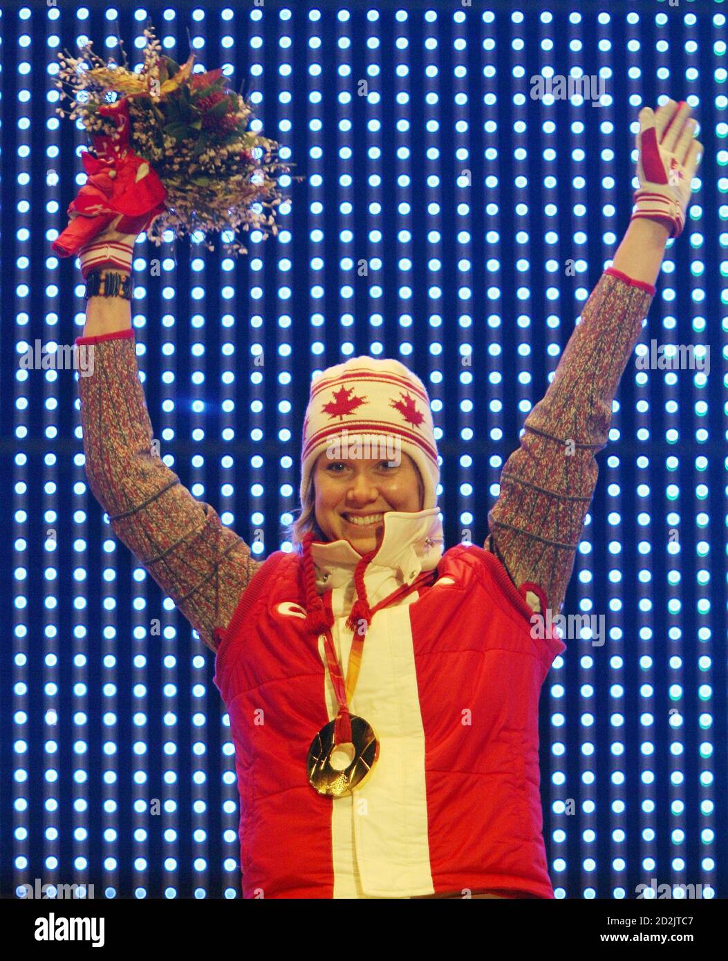 Canada's Cindy Klassen wears her gold medal, won in the women's 1500 metres speed skating event, at the Torino 2006 Winter Olympic Games in Turin, Italy, February 23, 2006. Stock Photo