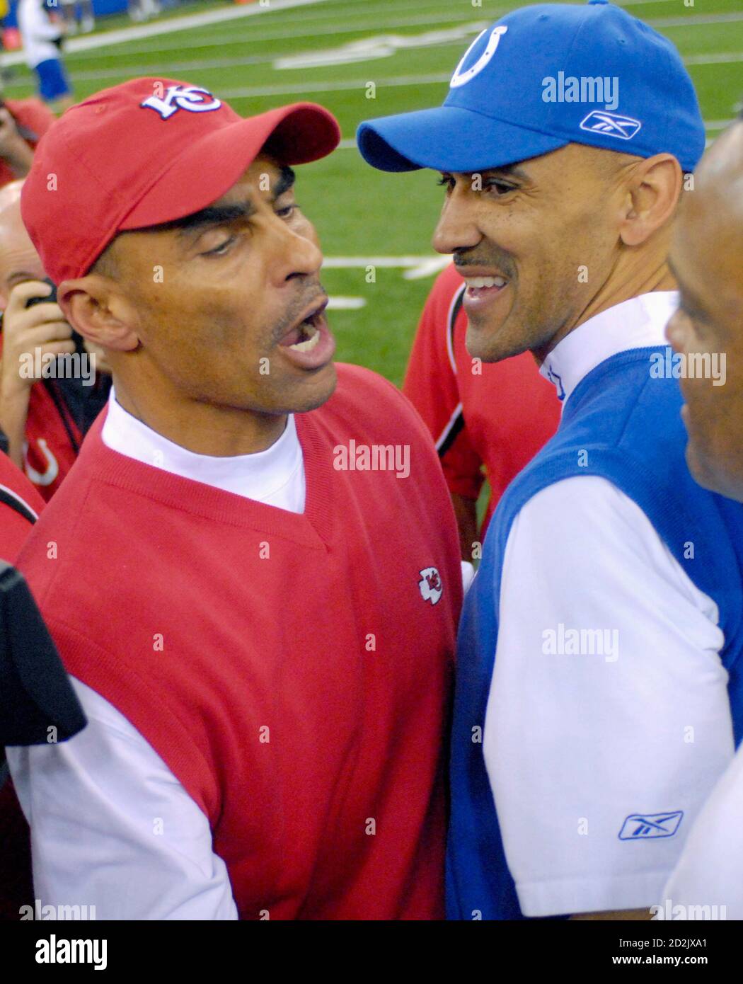 Indianapolis Colts head coach Tony Dungy (R) talks with Kansas City Chiefs  coach Herm Edwards (L) after their AFC Wild Card NFL playoff football game  in Indianapolis, January 6, 2007. Indianapolis defeated