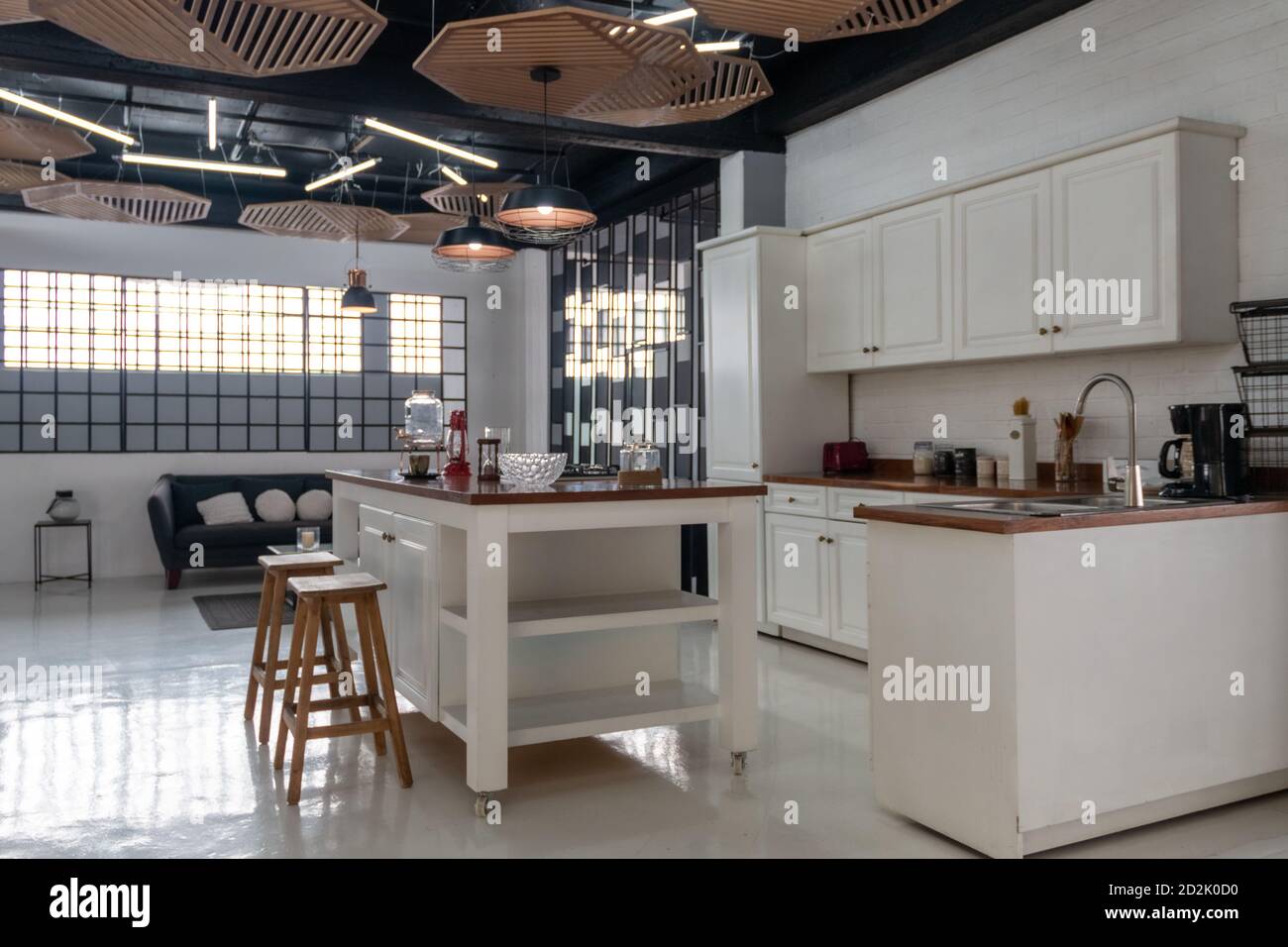 Modern new light interior of kitchen with white furniture and dining ...