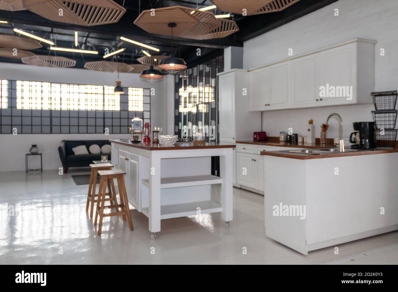 Modern new light interior of kitchen with white furniture and dining ...