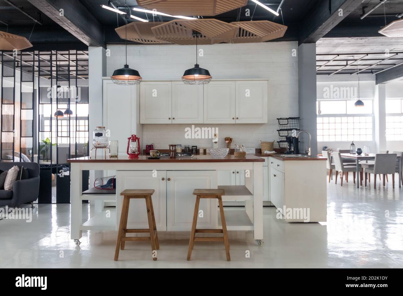 Modern new light interior of kitchen with white furniture and dining ...