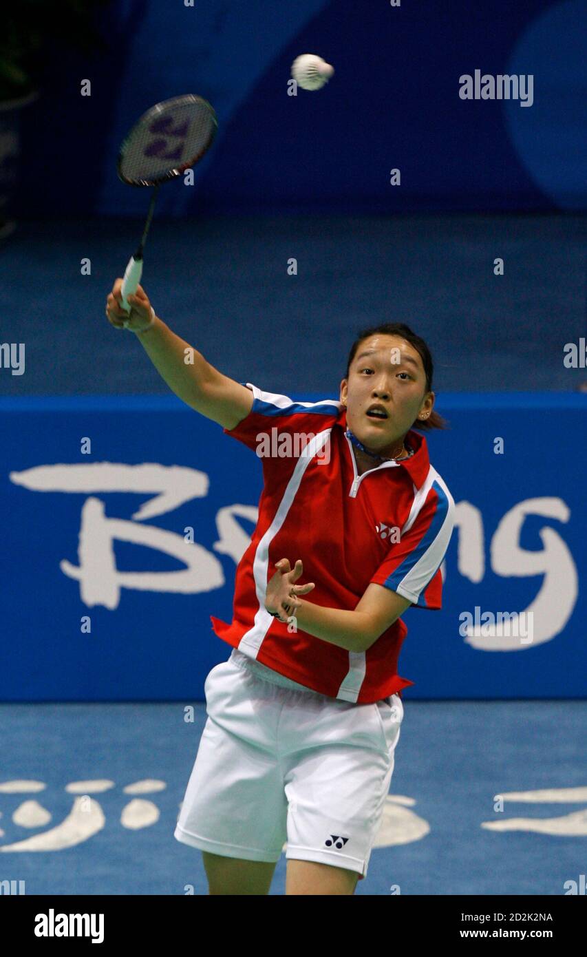 Eva Lee of the . hits a return to Anna Rice of Canada during her women's  singles first round badminton match at the Beijing 2008 Olympic Games  August 9, 2008. REUTERS/Beawiharta (CHINA
