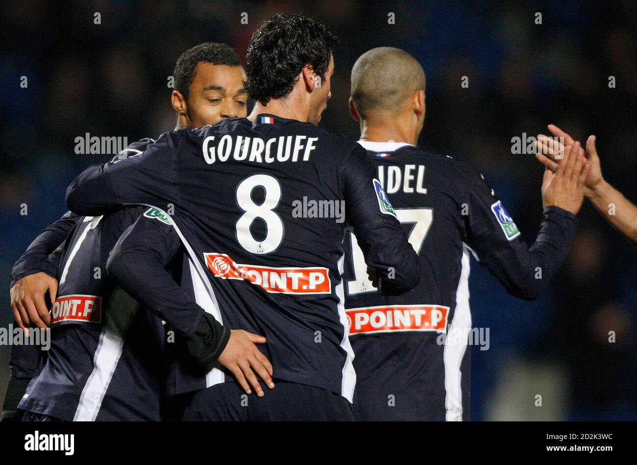 Yohann Gourcuff Of Bordeaux Celebrates With His Team Mate After Yoan Gouffran Opened The Scoring Against