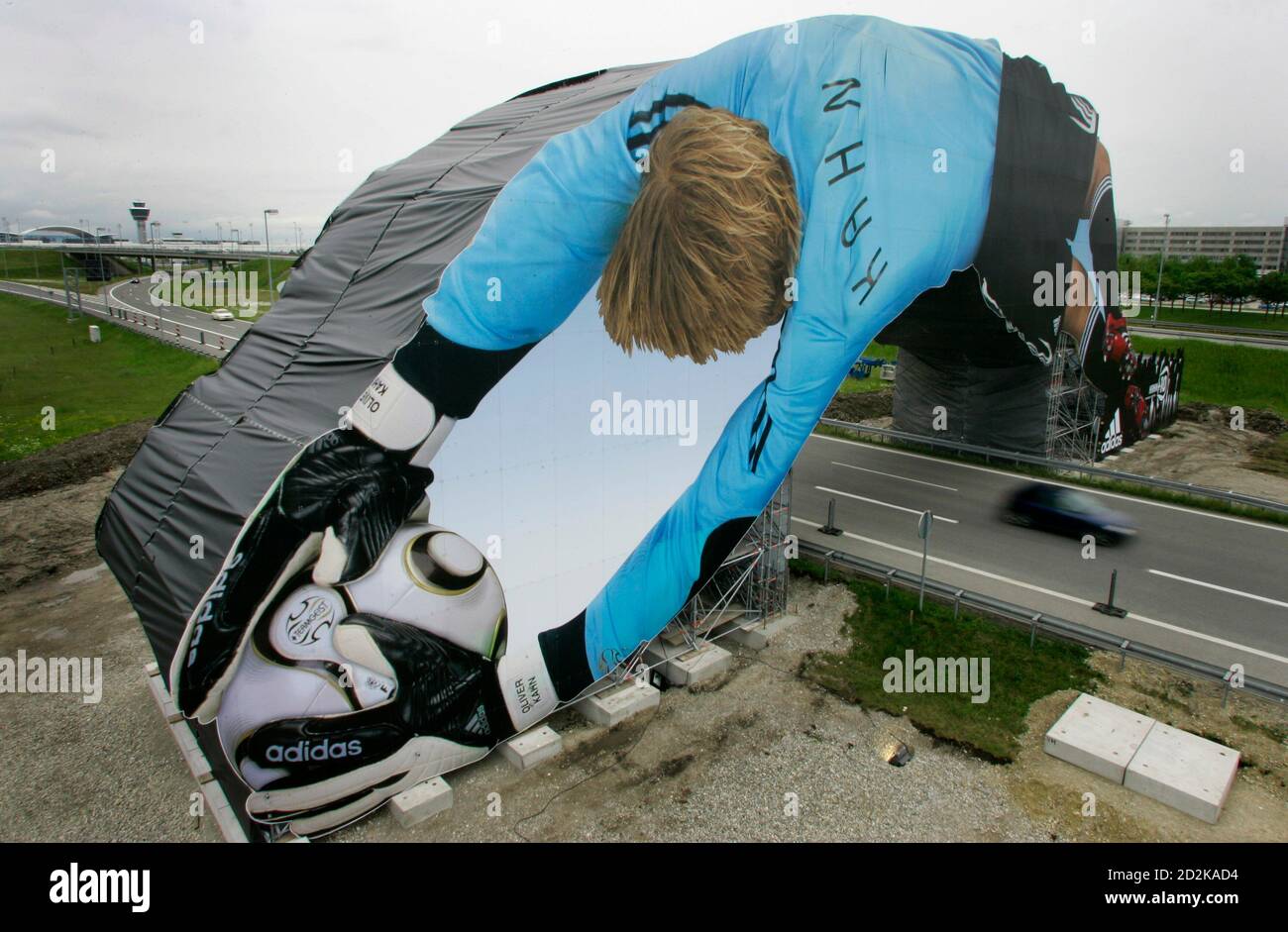 A giant poster of German national soccer team substitution goalkeeper  Oliver Kahn is pictured at Munich's airport May 29, 2006. The 65 meter long  placard is part of an Adidas campaign and