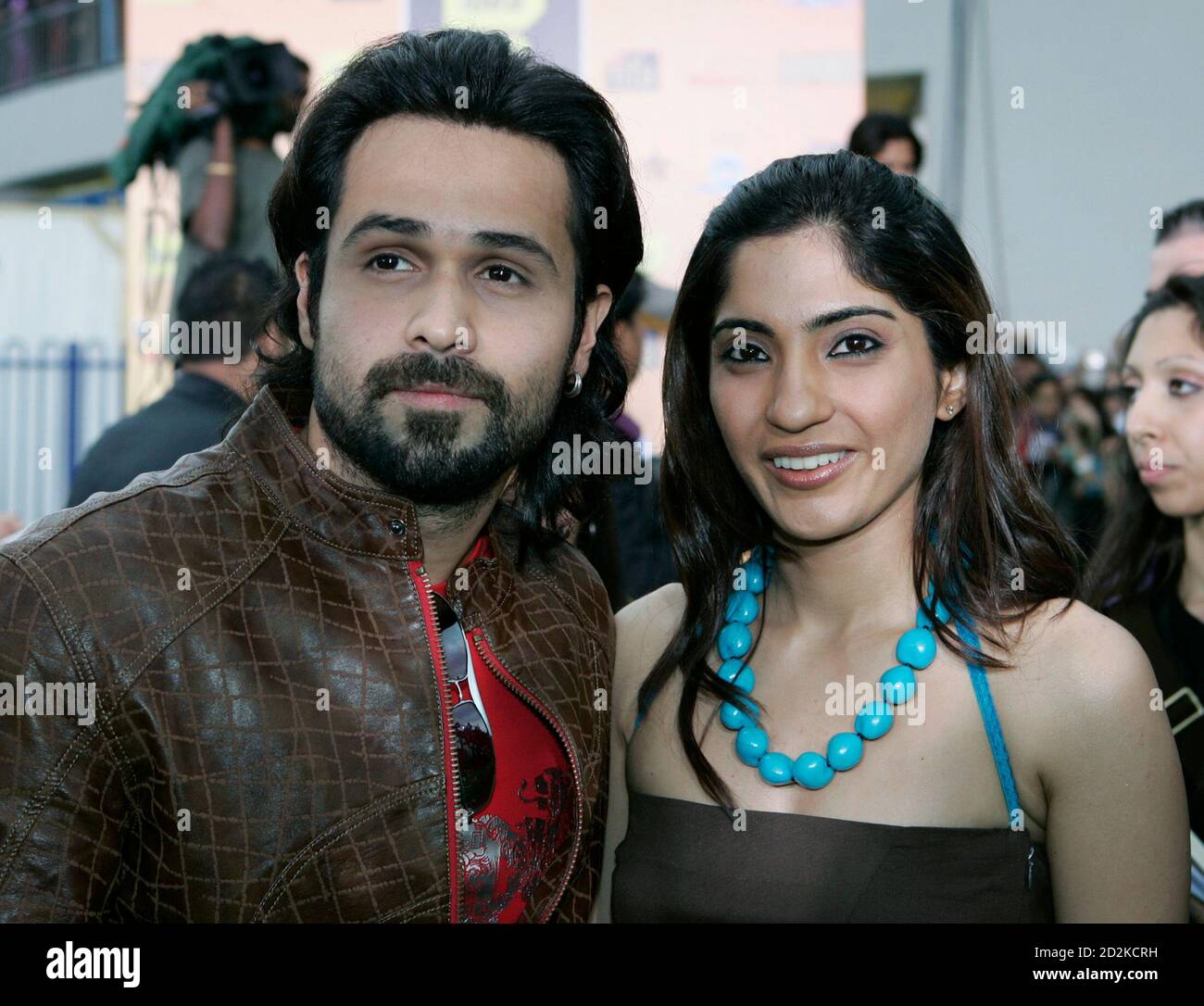 Bollywood actor Emraan Hashmi arrives with an unidentified guest for the  Indian International Academy Awards (IIFA) in Sheffield, northern England  June 9, 2007. REUTERS/David Moir (BRITAIN Stock Photo - Alamy