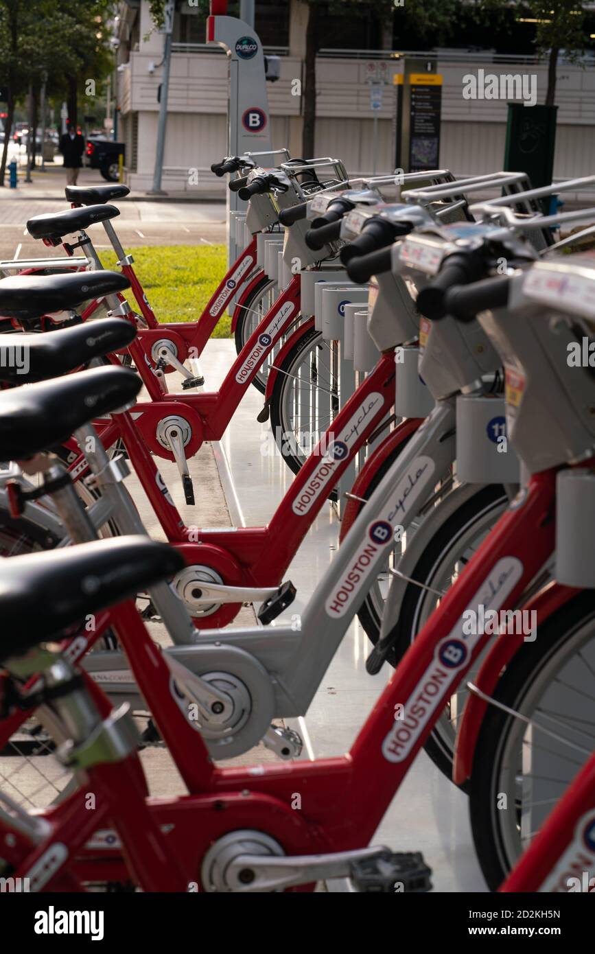 Public bikes downtown Stock Photo Alamy