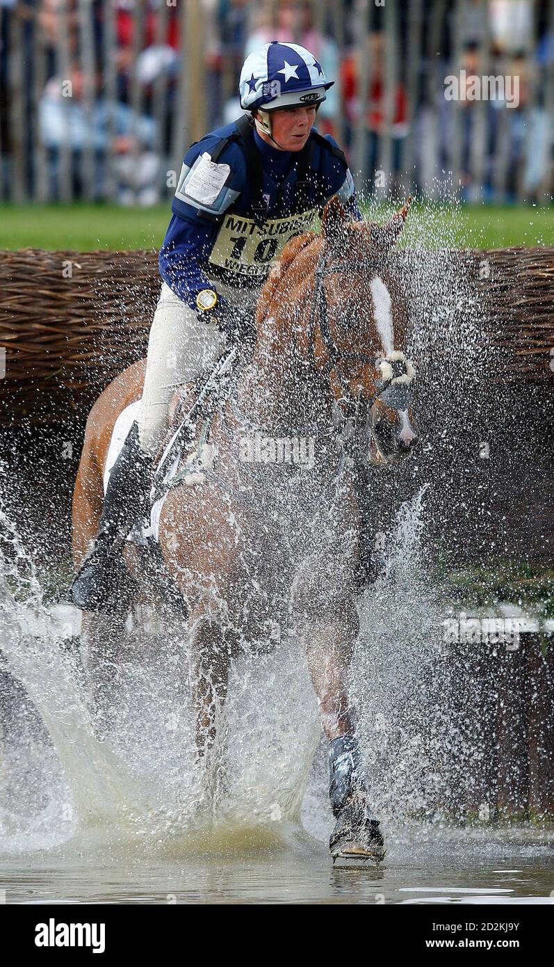 Britain's Lucy Wiegersma on Shaabrak jumps into the water during the cross country on the third day of The Badminton Horse Trials in Badminton, western England May 9, 2009. REUTERS/Eddie Keogh (BRITAIN SPORT EQUESTRIANISM) Stock Photo