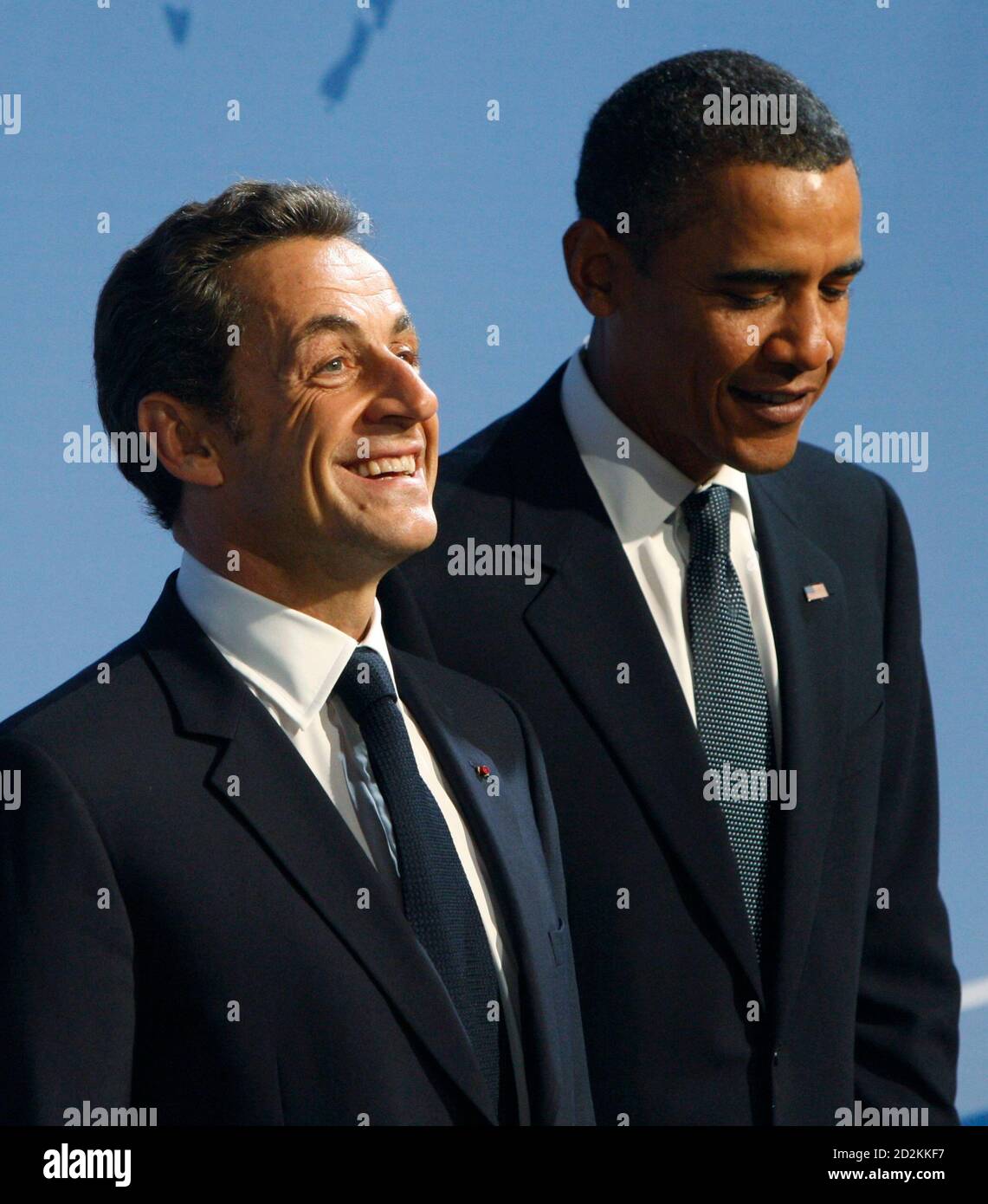 French President Nicolas Sarkozy (L) poses with U.S. President Barack Obama as he arrives at the Phipps Conservatory for an opening reception and working dinner for delegation leaders at the Pittsburgh G20 Summit in Pittsburgh, Pennsylvania September 24, 2009. REUTERS/Chris Wattie (UNITED STATES POLITICS) Stock Photo