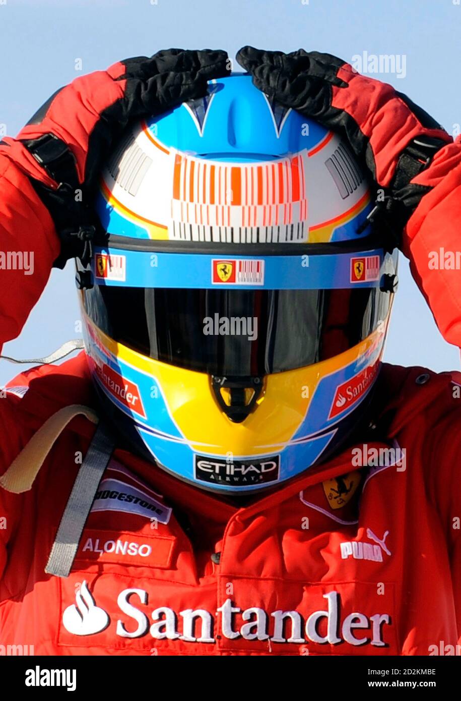 Ferrari F1 driver Fernando Alonso of Spain wears his helmet during the  \