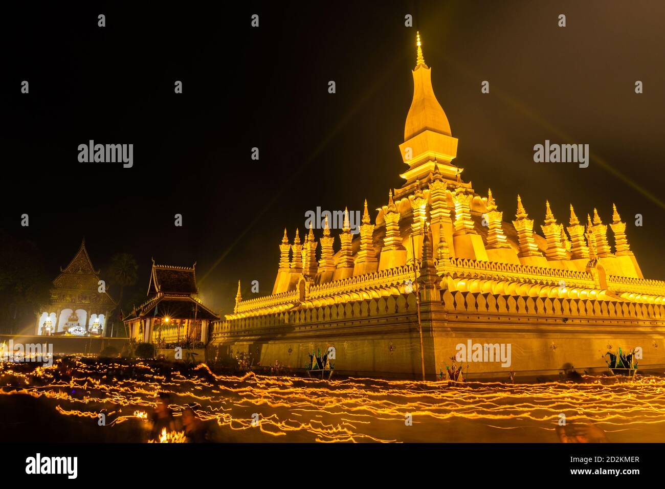 Vientiane, Laos. 11th Nov, 2019. People pray around the That Luang Stupa in Vientiane, Laos, on Nov. 11, 2019. Laos is the only landlocked country in Southeast Asia. In the central part of the country, the capital Vientiane is located on the alluvial plain on the Mekong River, suitable for fishing and plantation. The Lan Xang Kingdom, the first unified multi-ethnic nation in the history of Laos, moved its capital to Vientiane in the mid-16th century, and Vientiane gradually prospered. Credit: Kaikeo Saiyasane/Xinhua/Alamy Live News Stock Photo