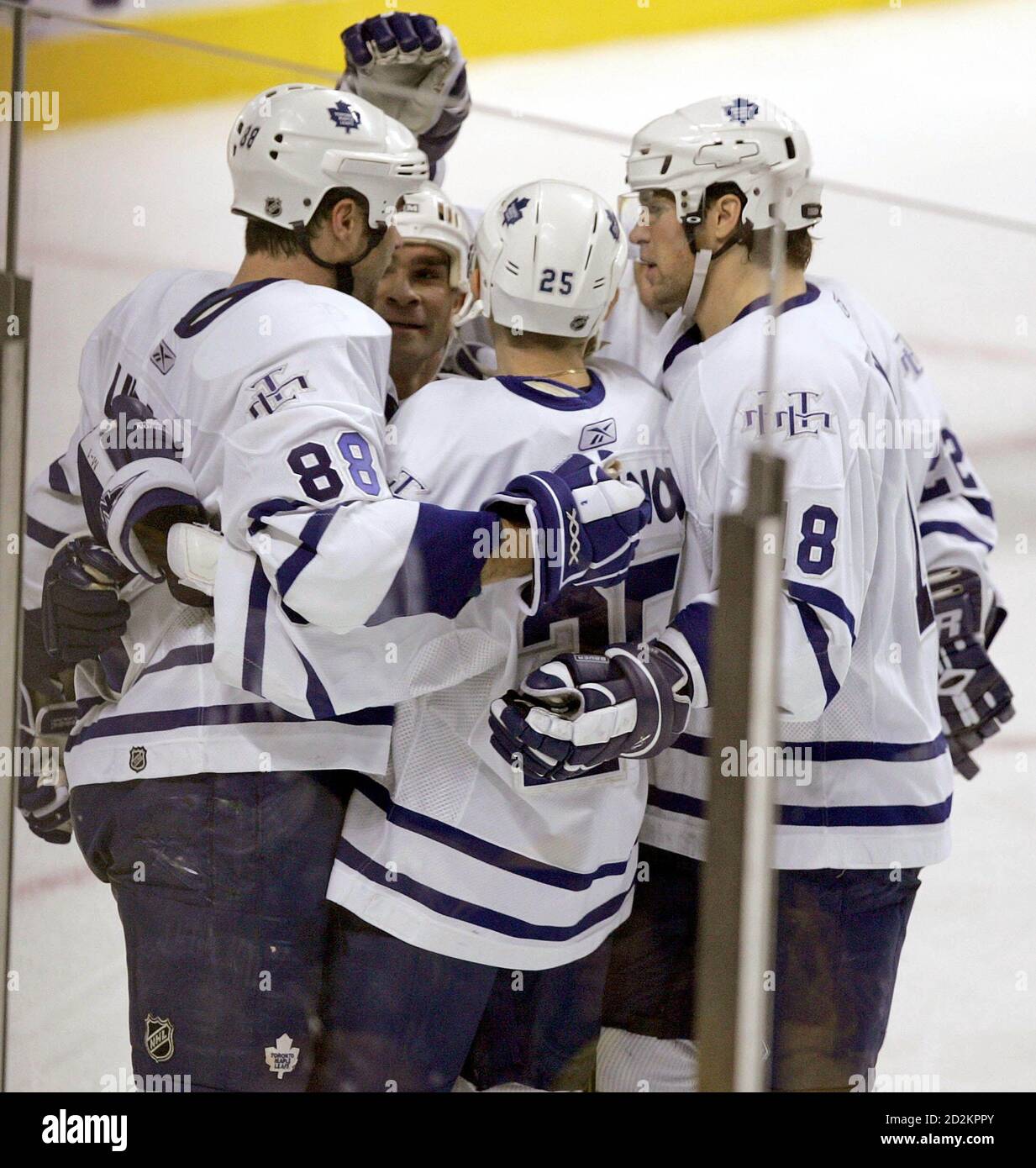 Toronto Maple Leafs Eric Lindros 88 Tie Domi C Alexander Khavanov 25 And Chad Kilger Celebrate After Lindros Scored A Goal During Third Period Play In Their Nhl Game In Boston November 17