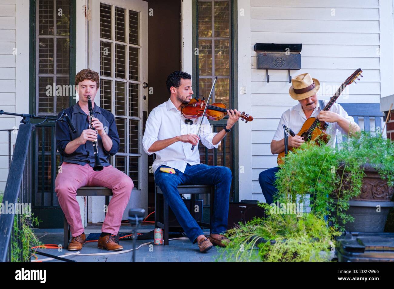 New Orleans, Louisiana/USA - 9/26/2020: Gypsy Jazz Musicians at Front Porch Concert in Uptown Neighborhood Stock Photo