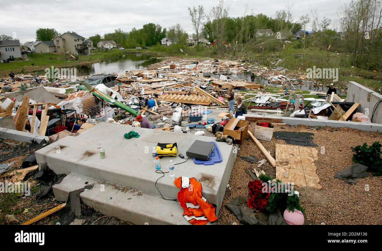 the-front-steps-of-the-house-where-a-two-year-old-was-killed-after-a-tornado-on-sunday-tore-through-the-subdivision-in-hugo-minnesota-are-seen-may-26-2008-at-least-seven-people-were-killed-on-sunday-by-tornadoes-and-violent-thunderstorms-spawned-by-a-powerful-spring-storm-system-that-moved-across-the-united-states-midsection-authorities-said-reutersandy-king-united-states-2D2M136.jpg