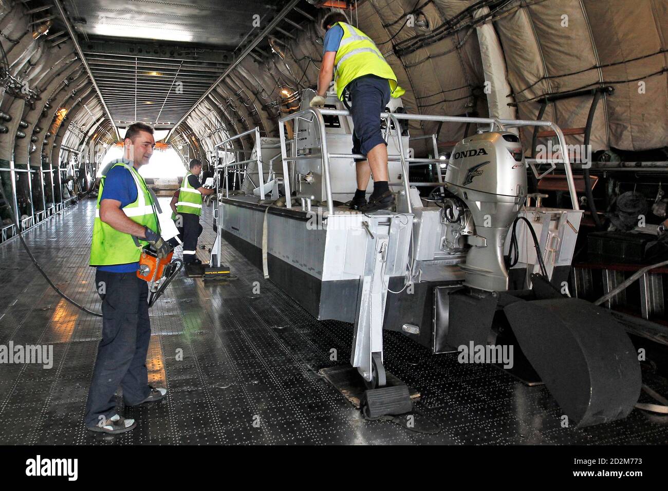 One Of Ten Specially Built Hydrocarbon Recovery Boats Is Loaded Onto A Transport Plane At Nantes Airport June 30 10 En Route For The Gulf Of Mexico The French Company Ecoceane Is Supplying One Of Ten Specially Built Hydrocarbon Recovery Boats Is Loaded Onto A Transport Plane At Nantes Airport June 30 10 En Route For The Gulf Of Mexico The French Company Ecoceane Is Supplying