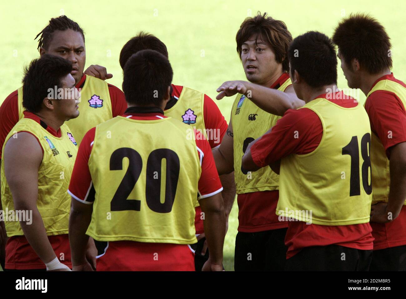 Japan rugby team captain Takuro Miuchi (C) gestures during rugby training session at stadium Michel Bendicou in Colomiers, southwestern France, September 15, 2007. Japan plays in Pool B with Australia, Wales, Fiji and Canada in the Rugby World Cup 2007 REUTERS/Jean-Philippe Arles (FRANCE) Stock Photo