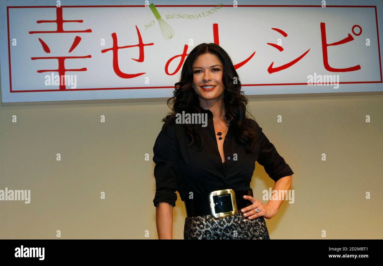 Actress Catherine Zeta Jones Poses After A News Conference To Promote Her Film No Reservations In Tokyo September 19 07 The Title In The Wall Reads Recipe Of Happiness Which Is The Japanese Actress Catherine Zeta Jones Poses After A News Conference To Promote Her Film No Reservations In Tokyo September 19 07 The Title In The Wall Reads Recipe Of Happiness Which Is The Japanese
